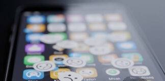 How to Choose the Right Apps for Your Smartphone: Expert Tips & Tricks Smudged phone screen with frowny face app icons