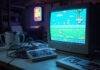 Video Games Retro Gaming Blurry basement desk with CRT, NES, mug, arcade sign glow
