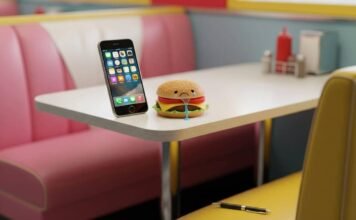 Top 10 Must-Have Apps in 2025 That Will Change Your Daily Life Diner booth, glowing phone, sad burger, chewed pen