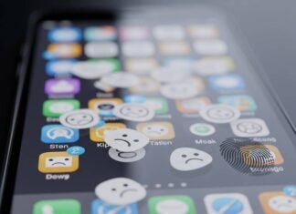 How to Choose the Right Apps for Your Smartphone: Expert Tips & Tricks Smudged phone screen with frowny face app icons
