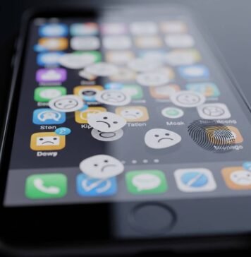 How to Choose the Right Apps for Your Smartphone: Expert Tips & Tricks Smudged phone screen with frowny face app icons