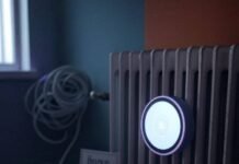 Smart Home Vs Traditional Home: Which One Saves You More Money Over Time? Smart thermostat glows by rusty radiator, bills spill, quirky sign